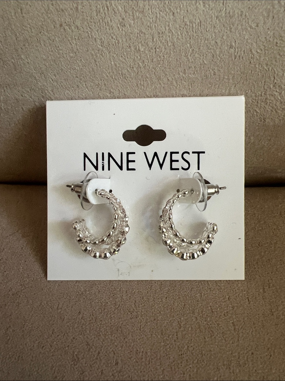 NWT Nine West Silver Faceted C-Shaped Hoop Earrings